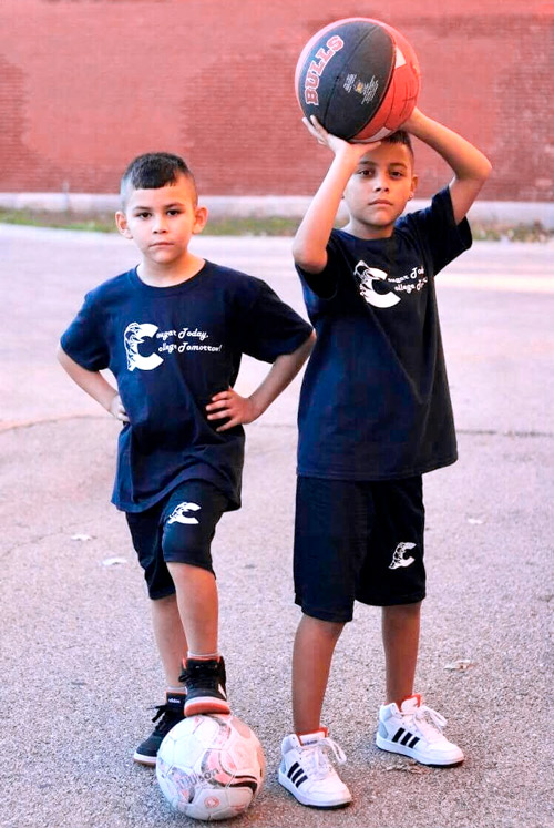 two boys in school gym uniform